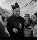 Father Maurice with children